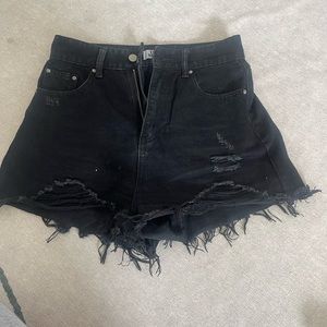 Ripped high waisted black jean shorts